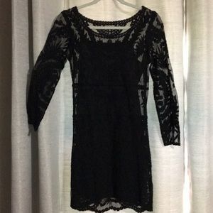 Black lace cocktail dress.